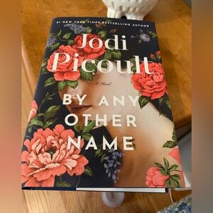 PICK ANY 3 ITEMS FOR $10 - Jodi Picoult "By Any Other Name" Hardcover Book
